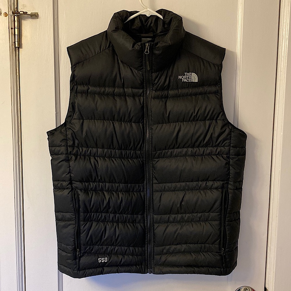 The North Face 550 down vest. Black. No stains, snags, rips or tears. Size LARGE